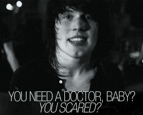a black and white photo of a man with the words " you need a doctor baby you scared " below him