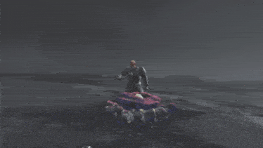 a man and a woman are standing on a rocky surface in a video game