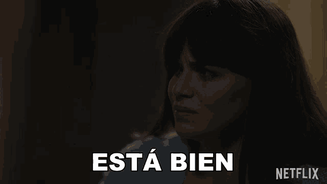 a netflix ad shows a woman in a blue shirt