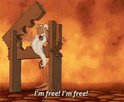 a man with a beard is standing in a wooden stockade and saying i 'm free i 'm free