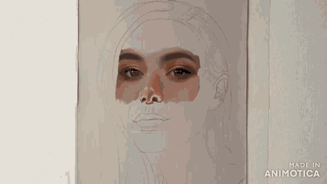 a person is painting a woman 's face with a brush and the words made in animatica are visible
