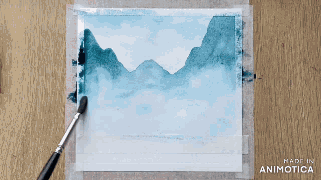 a painting of mountains is being made in an animated video