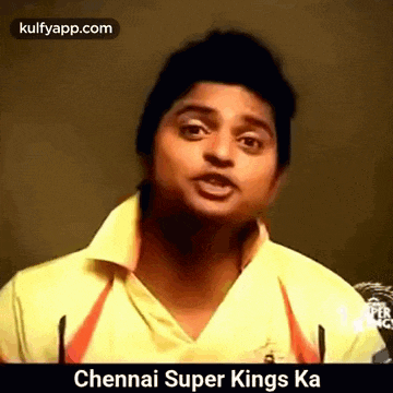 a man in a yellow shirt is making a funny face and talking about chennai super kings .
