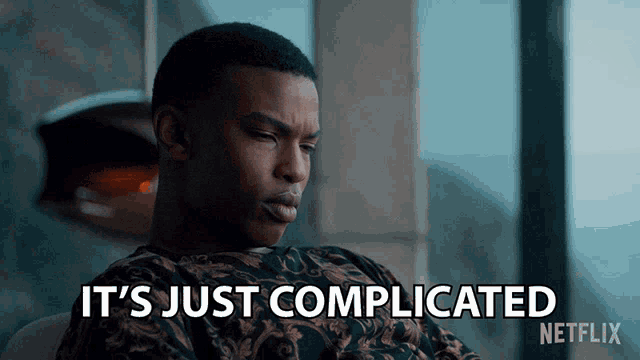 a man says it 's just complicated in front of a window