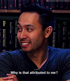 a man in a blue shirt is smiling and asking " why is that attributed to me "