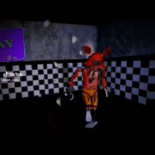 a blurry picture of a person standing in a dark room with a purple light behind them .