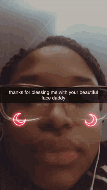 a girl wearing glasses says thanks for blessing me with your beautiful face daddy on her face