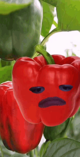 a red pepper with a purple mouth and eyes