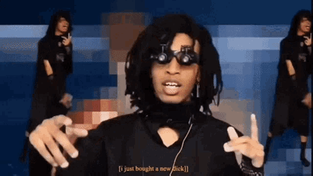 a man with dreadlocks is wearing goggles and says i just bought a new dick