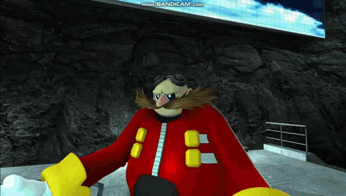 a cartoon character with a red jacket and yellow gloves is standing in front of a wall .