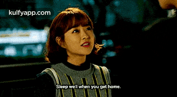a woman in a sweater is talking to a man and says sleep well when you get home .