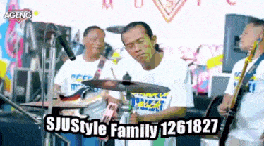 a man is playing drums in a band with the name sjustyle family 1261827 on the bottom