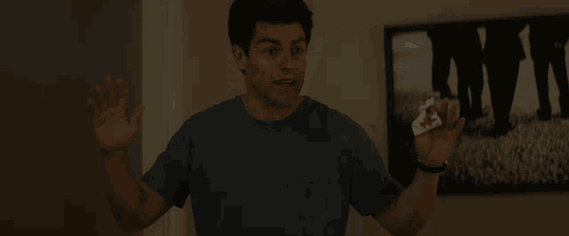 a man says total nut job in front of a picture