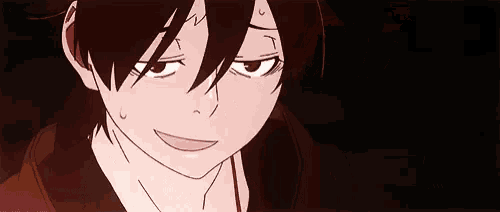 a close up of a person 's face with a surprised look on his face .