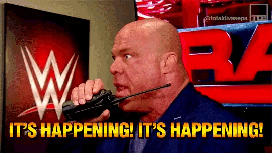 a bald man is talking into a walkie talkie with the words it 's happening on the bottom