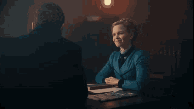 a woman sitting at a table talking to a man with the words " i hoped it would be that " above her