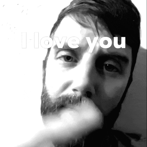 a black and white photo of a man with the words " i love you " above his face