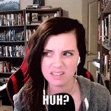 a woman wearing headphones and a microphone has the word huh on her face