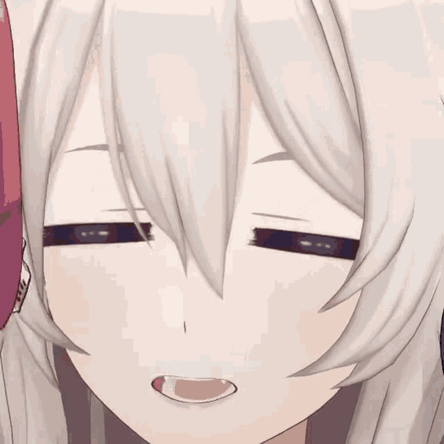 a close up of a cartoon character 's face with a surprised look on her face