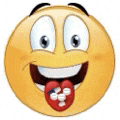 a smiley face with a heart sticking out of it .