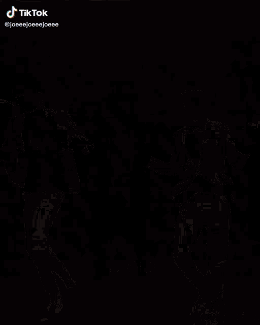 a blurred image of a person 's face with a tik tok watermark