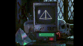 a computer monitor with a triangle on the screen and a green button that says n222