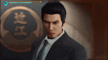 a man in a suit and tie is saying i 'll give ' em a taste of my fists