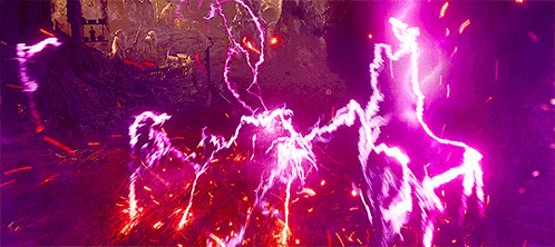 a purple lightning bolt is being thrown in the dark