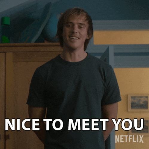 a man in a t-shirt says nice to meet you