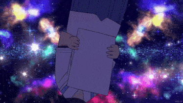 a person is holding a piece of paper in front of a galaxy
