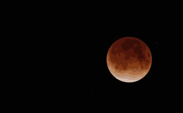 three phases of a full moon are shown in a dark sky