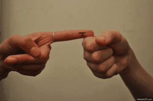 a person with a tattoo on their finger that says " i love "