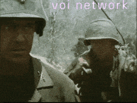 two soldiers are standing next to each other with the words voi network written on the bottom