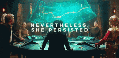 a group of people sitting around a table with the words " nevertheless she persisted " on the bottom