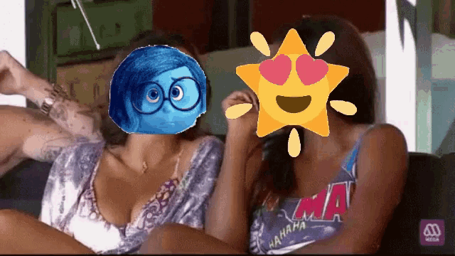two women are sitting on a couch and one has a cartoon character on her face