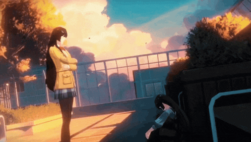 a girl in a yellow jacket is standing next to a girl in a black skirt