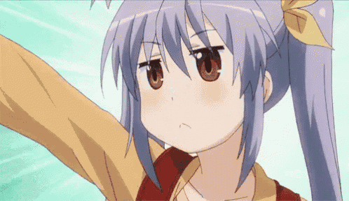 a girl with purple hair and brown eyes has a ponytail