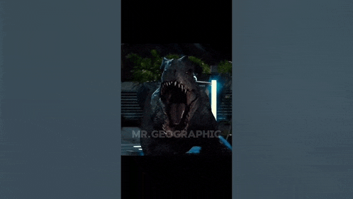 a close up of a dinosaur with its mouth open .