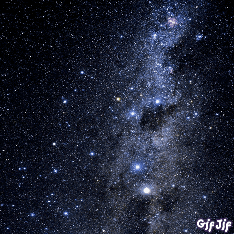 a gif of a cartoon character flying through the stars