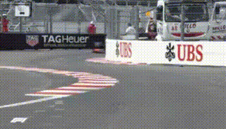 a race track with a ubs sign on the side