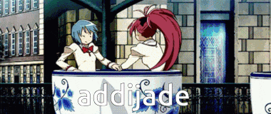 a couple of anime characters sitting in a cup that says addijade on it