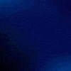 a blurry picture of a man 's face with a blue background