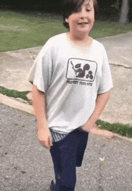 a boy wearing a shirt that says playboy toys
