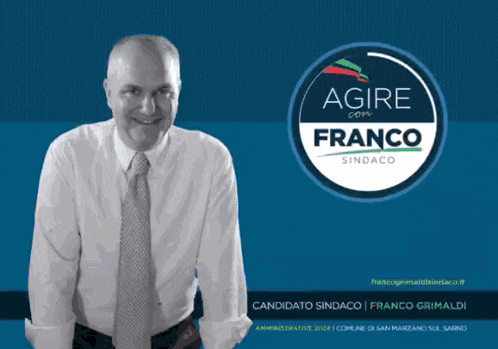 a man in a white shirt and tie stands in front of a sign that says agire con franco
