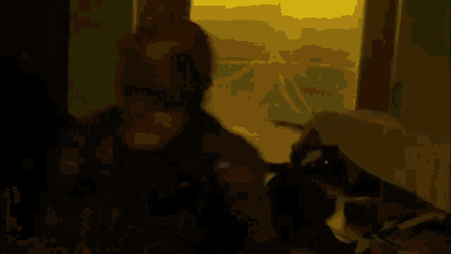a silhouette of a person jumping out of a window at night
