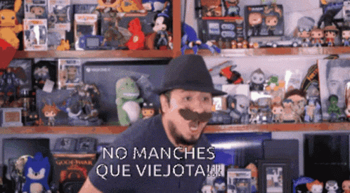 a man with a hat and mustache says no manches que viejota !!!