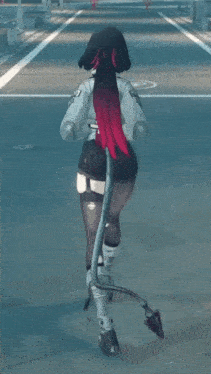 a woman with long red hair is walking down a street .