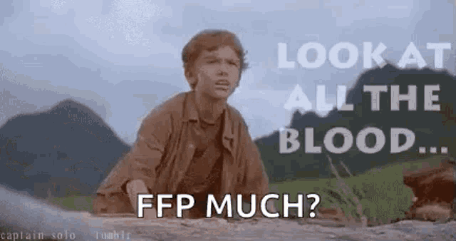 a young boy is sitting on a rock in a field and says `` look at all the blood ... ffp much ? ''