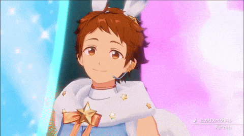 a boy with bunny ears is wearing a white cape