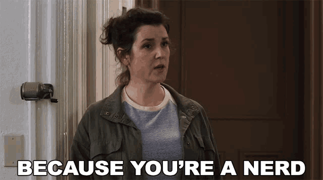 a woman is standing in a doorway with the words because you 're a nerd behind her